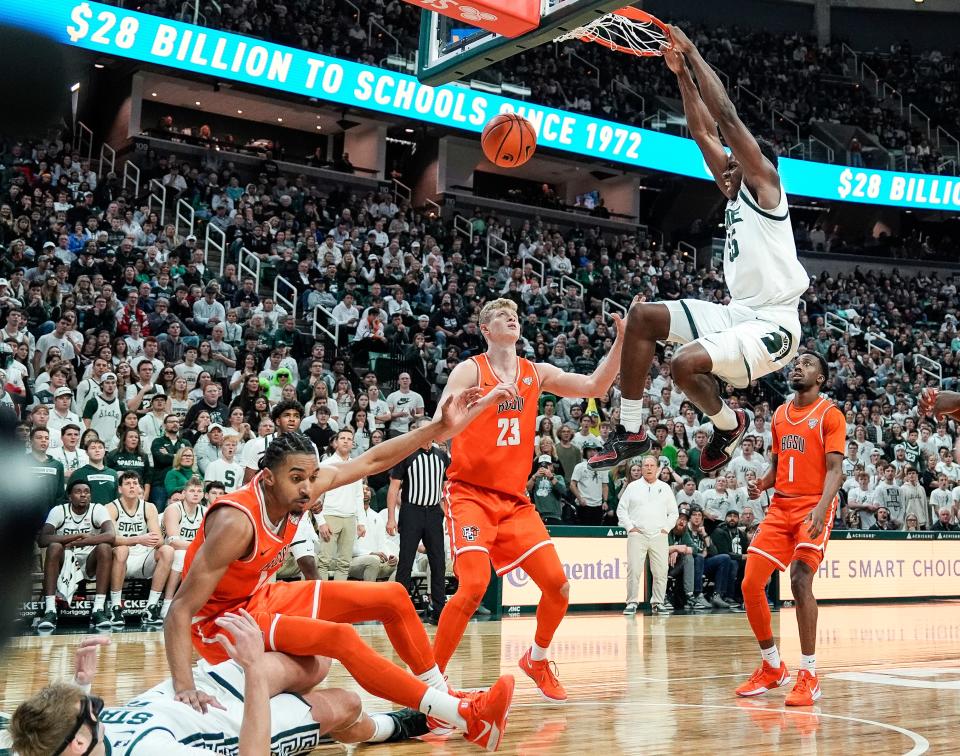 Michigan State forward Coen Carr (55) dunks against Bowling Green during the second half at Breslin Center in East Lansing on Saturday, Nov. 16, 2024.
