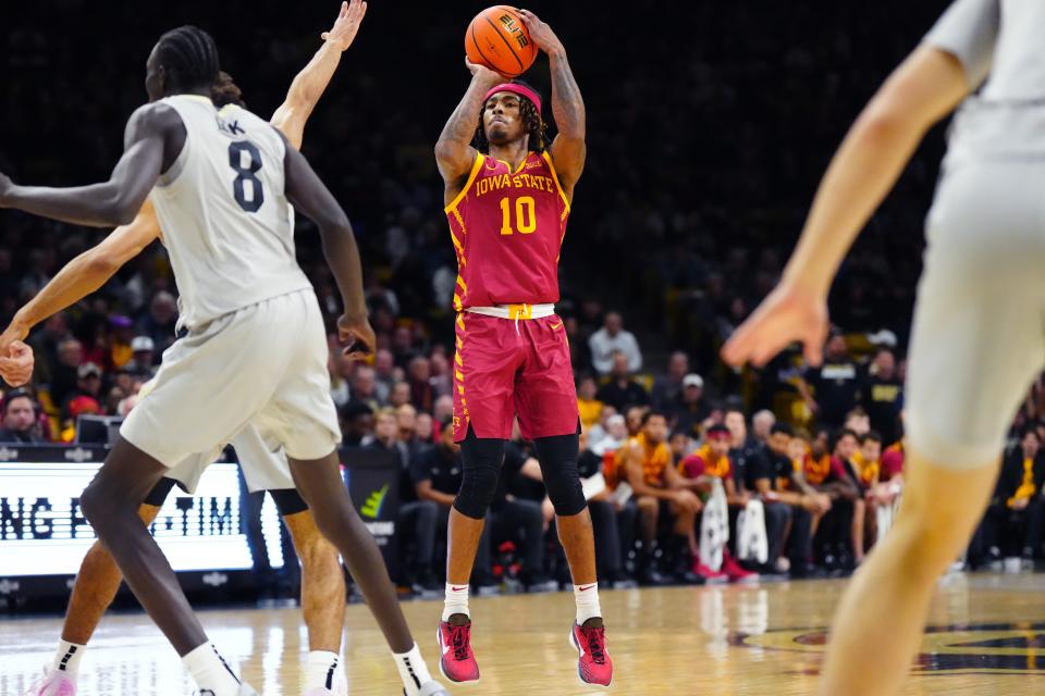 Dec 30, 2024; Boulder, Colorado, USA; Iowa State Cyclones guard Keshon Gilbert (10) lines up a shot in the first half against the Colorado Buffaloes at CU Events Center. Mandatory Credit: Ron Chenoy-Imagn Images