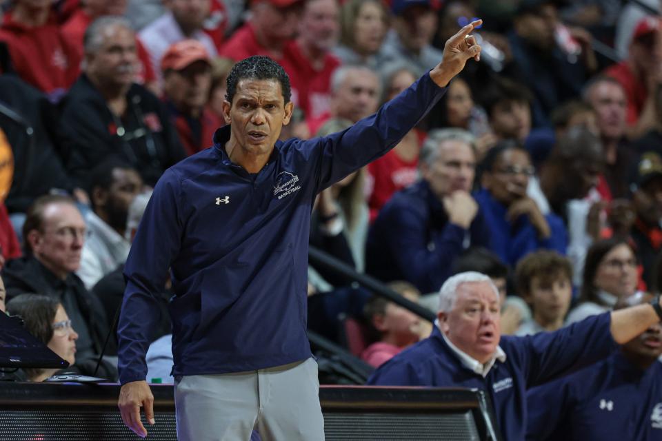 Nov 15, 2024; Piscataway, New Jersey, USA; Monmouth Hawks head coach King Rice reacts during the first half against the Rutgers Scarlet Knights at Jersey Mike's Arena. Mandatory Credit: Vincent Carchietta-Imagn Images