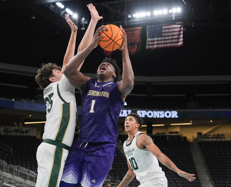 Great Osobor, 1, of the University of Washington scores against Colorado St. during the 2024 Acrisure Mens Invitational in Palm Desert, Calif., Nov. 28, 2024.
