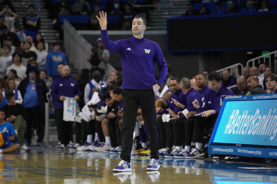 Dec 3, 2024; Los Angeles, California, USA; Washington Huskies head coach Danny Sprinkle gestures in the first half against the UCLA Bruins at Pauley Pavilion presented by Wescom. Mandatory Credit: Kirby Lee-Imagn Images