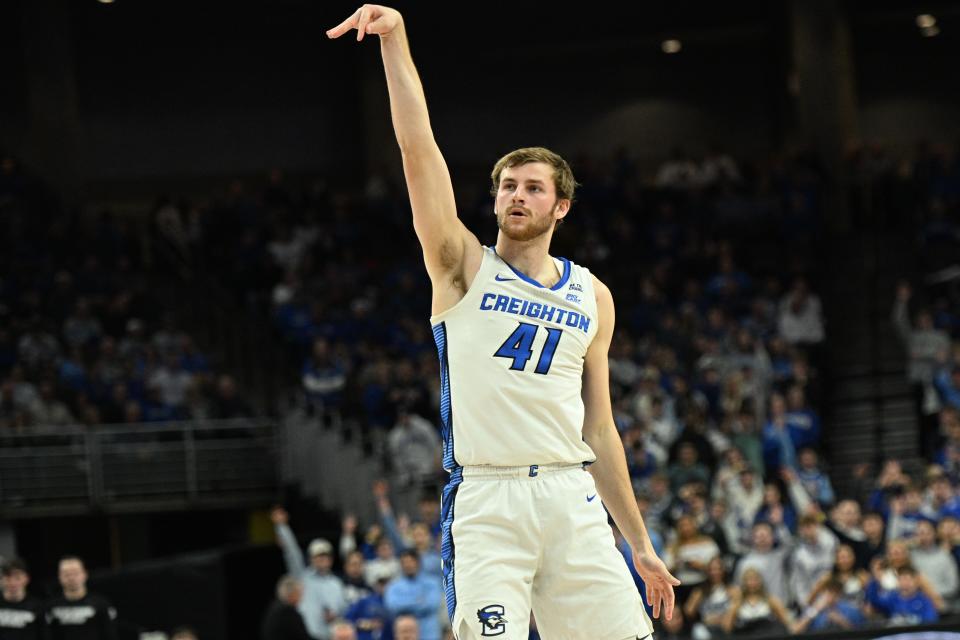 Jan 14, 2025; Omaha, Nebraska, USA; Creighton Bluejays forward Isaac Traudt (41) scores on a three point attempt against the Providence Friars during the second half at CHI Health Center Omaha. Mandatory Credit: Steven Branscombe-Imagn Images