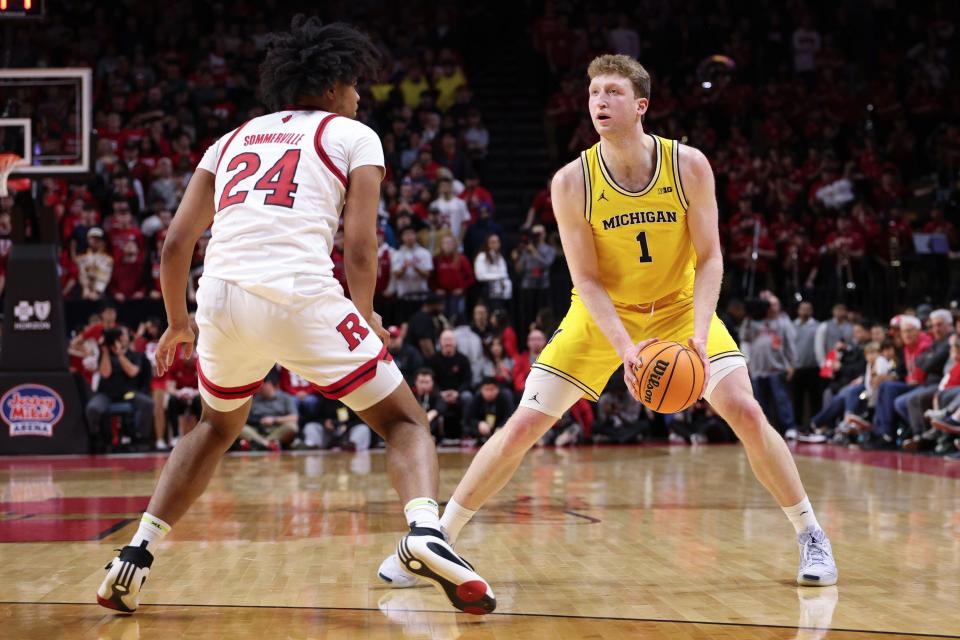 Michigan Wolverines center Danny Wolf looks to the basket as Rutgers Scarlet Knights center Lathan Sommerville defends during the first half at Jersey Mike's Arena, Feb. 1, 2025.